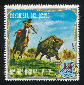 EQUATORIAL GUINEA - CIRCA 1976: stamp printed by Equatorial Guinea, shows Inidian and Cowboy, circa 1976