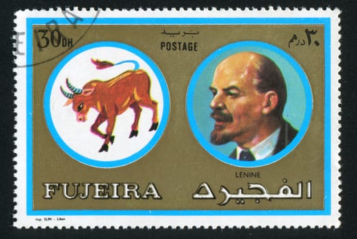FUJEIRA - CIRCA 1976: stamp printed by Fujeira, shows Lenin and bull, circa 1976