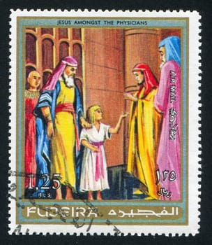 FUJEIRA - CIRCA 1976: stamp printed by Fujeira, shows Jesus amongst the Physicians, circa 1976