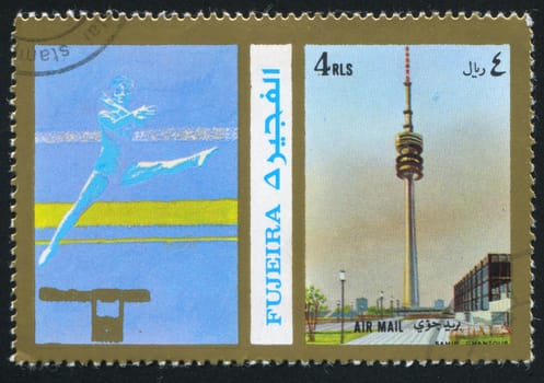 FUJEIRA - CIRCA 1976: stamp printed by Fujeira, shows a Sportsman and a Spire, circa 1976