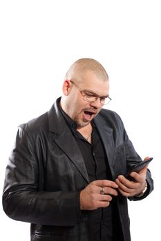 Surprised man looking on a tablet PC on white background