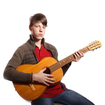 young boy with guitar on white background