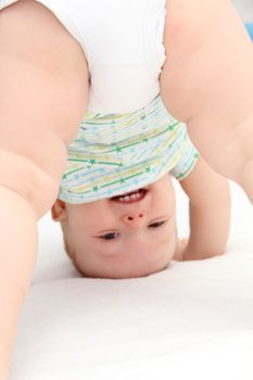baby standing on head
