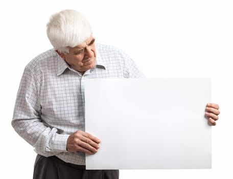 Mature man holding a blank billboard isolated on white background