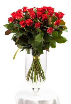 Bouquet of red roses over white background