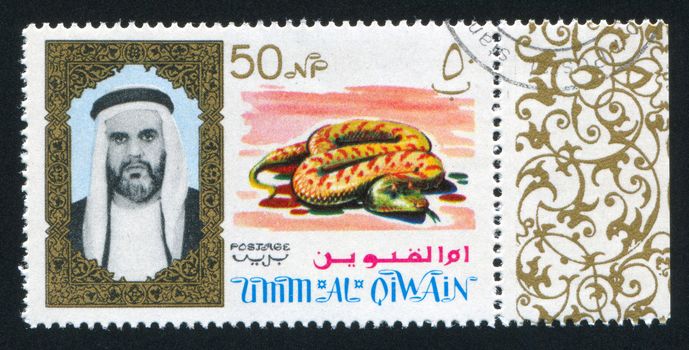UMM AL-QUWAIN - CIRCA 1972: stamp printed by Umm al-Quwain, shows Sheikh and Snake, circa 1972