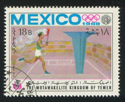 YEMEN - CIRCA 1968: stamp printed by Yemen, shows Sportsman and Olympic fire, circa 1968