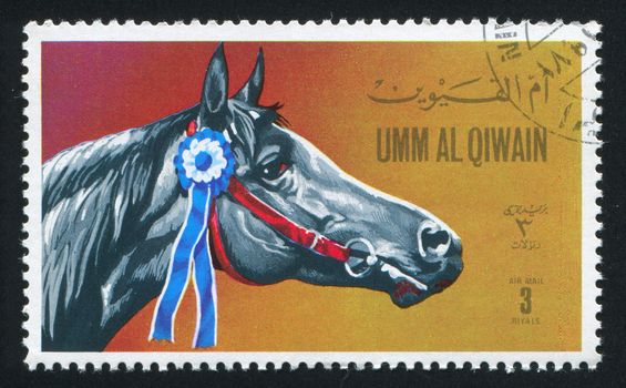 UMM AL-QUWAIN - CIRCA 1972: stamp printed by Umm al-Quwain, shows a Horse, circa 1972