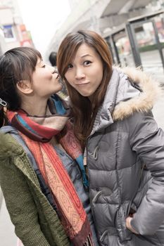 Happy smiling Asian women in city, taipei, Taiwan.