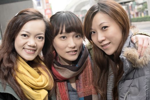 Happy smiling Asian women in city, taipei, Taiwan.