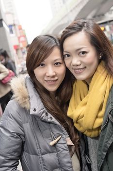 Happy smiling Asian women in city, taipei, Taiwan.