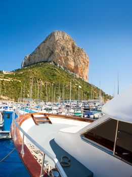 Calpe Alicante marina boats with Penon de Ifach mountain in Mediterranean sea of Spain