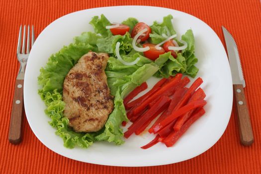 fried pork with salad