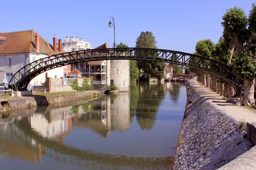 The rainbow bridge channel bordered by trees