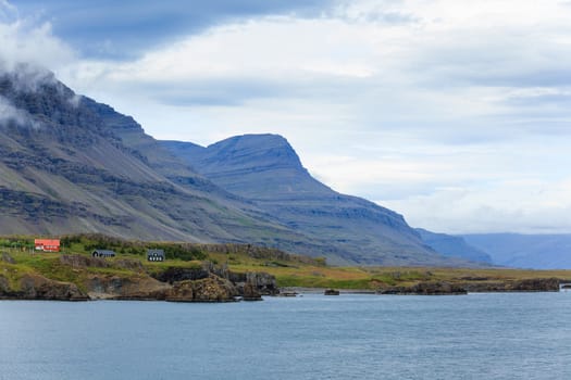 Cloudy sky over the coast in the East Fjords Iceland.