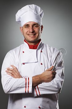 Male chef portrait against grey background