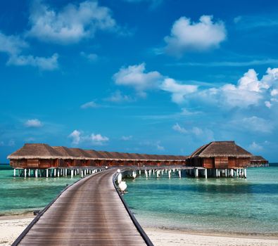 Beautiful beach with water bungalows at Maldives