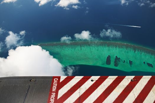 Group of atolls and islands in Maldives, from view seaplane