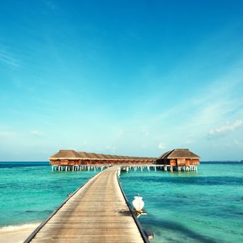 Beautiful beach with water bungalows at Maldives