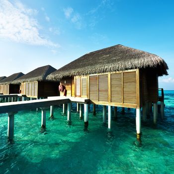 Beautiful beach with water bungalows at Maldives