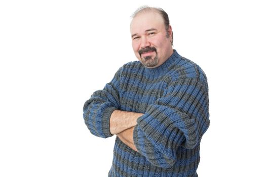 Portrait of a friendly mature man with arms crossed on a white background