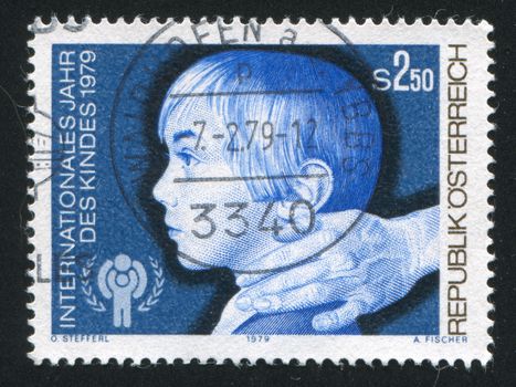 AUSTRIA - CIRCA 1979: stamp printed by Austria, shows Child and International Youth Confederation Emblem, circa 1979