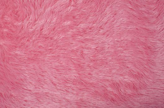 Full frame take of furry pink fleece fabric