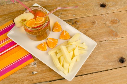 A kid dessert with apple slices resembling French fries