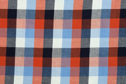 Material in a colorful plaid, a textile background.