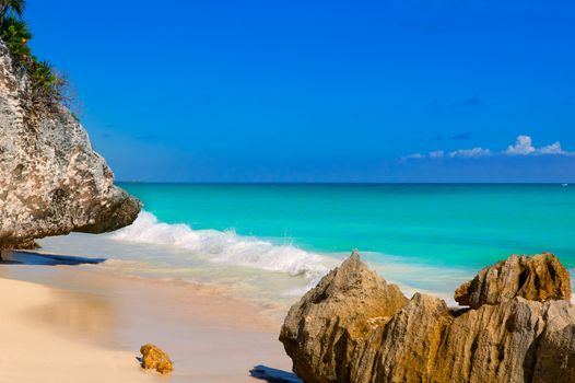 Tulum beach near Cancun turquoise Caribbean water and blue Sky