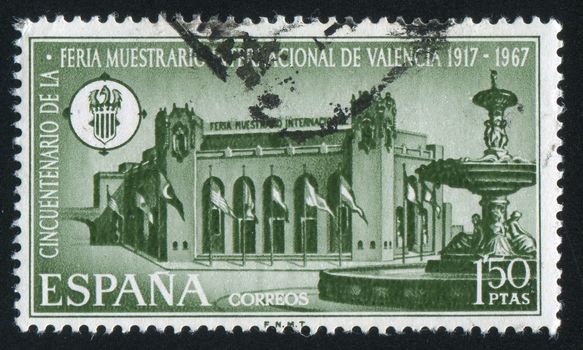 SPAIN - CIRCA 1967: stamp printed by Spain, shows Exhibition Building and Fountain in Valencia, circa 1967