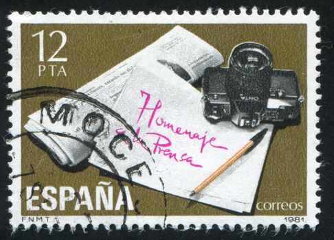 SPAIN - CIRCA 1981: stamp printed by Spain, shows Newspaper and Camera, circa 1981