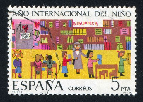 SPAIN - CIRCA 1979: stamp printed by Spain, shows Children in Library, circa 1979