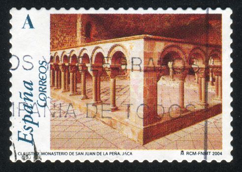 SPAIN - CIRCA 2004: stamp printed by Spain, shows Cloister, Monastery of San Juan de la Pena, Jaca, circa 2004