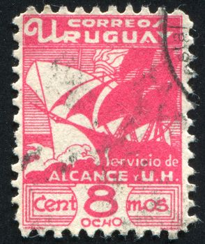 URUGUAY - CIRCA 1936: stamp printed by Uruguay, shows Galleon and Modern Steamship, circa 1936