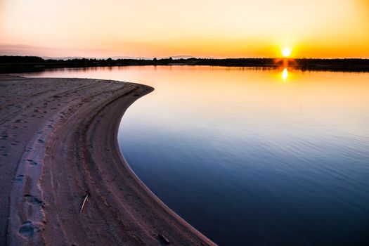 Sandy beach on a beautiful cristal lake