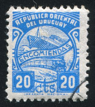 URUGUAY - CIRCA 1938: stamp printed by Uruguay, shows Ship and Train, circa 1938