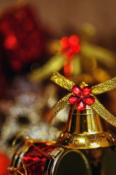 Festive Christmas golden bells photographed close-up background