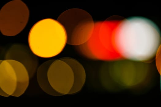 Abstract defocused lights of the night city bokeh background