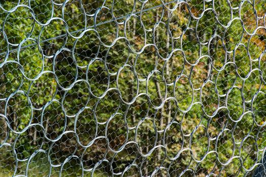 wire containment mesh repair constructed for the passage of vehicles by landslides