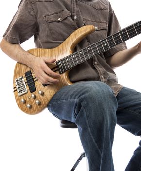 Bass guitarist playing his bass guitar (Series with the same model available)