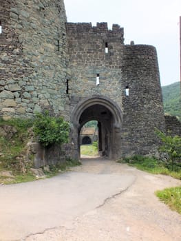 The only entrance to the Akhtala Monastery is on the northern side protected by walls with round, cone-shaped towers.