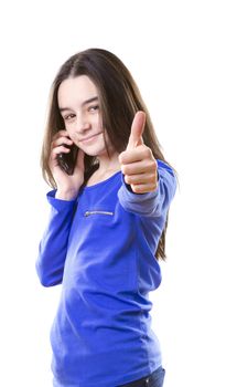 Teenage girl with smartphone poiting with her finger at camera on white background 