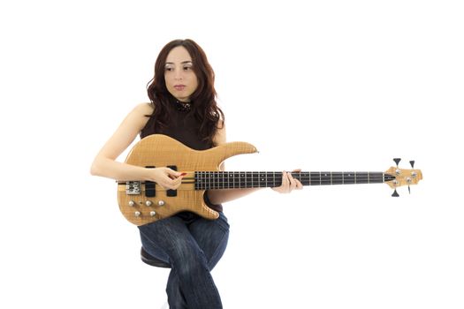 Young woman sitting and playing bass guitar (Series with the same model available)