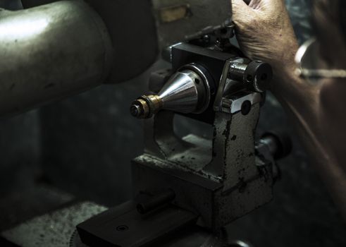Close up of machining a golden ring