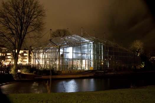 AMSTERDAM, THE NETHERLANDS: Hortus Botanicus Amsterdam Building with lights at annual Amsterdam Light Festival on December 30, 2013. Amsterdam Light Festival is a winter light festival  