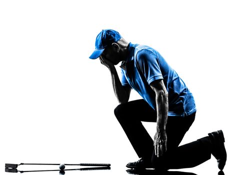 one man golfer golfing in silhouette studio isolated on white background