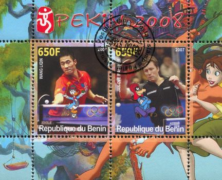 BENIN - CIRCA 2007: stamp printed by Benin, shows Jan-Ove Waldner, Disney Caharacter and Olympic Rings, circa 2007