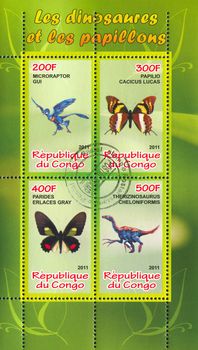 CONGO - CIRCA 2011: stamp printed by Congo, shows butterfly and dinosaur, circa 2011