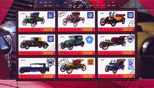 RWANDA - CIRCA 2010: stamp printed by Rwanda, shows retro car, circa 2010